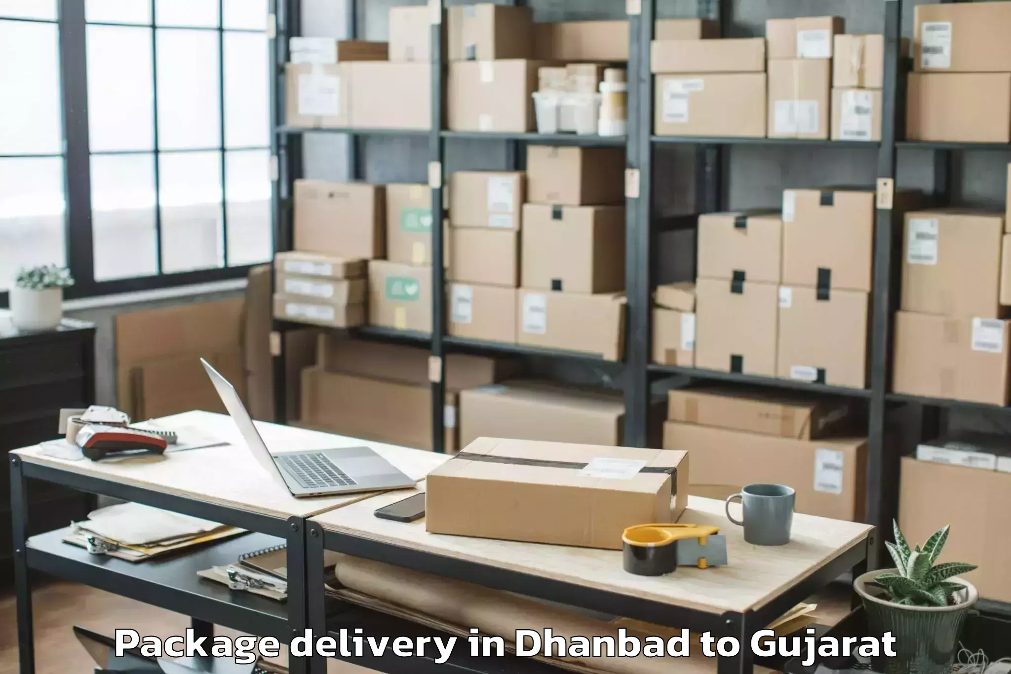 Easy Dhanbad to Una Gir Somnath Package Delivery Booking